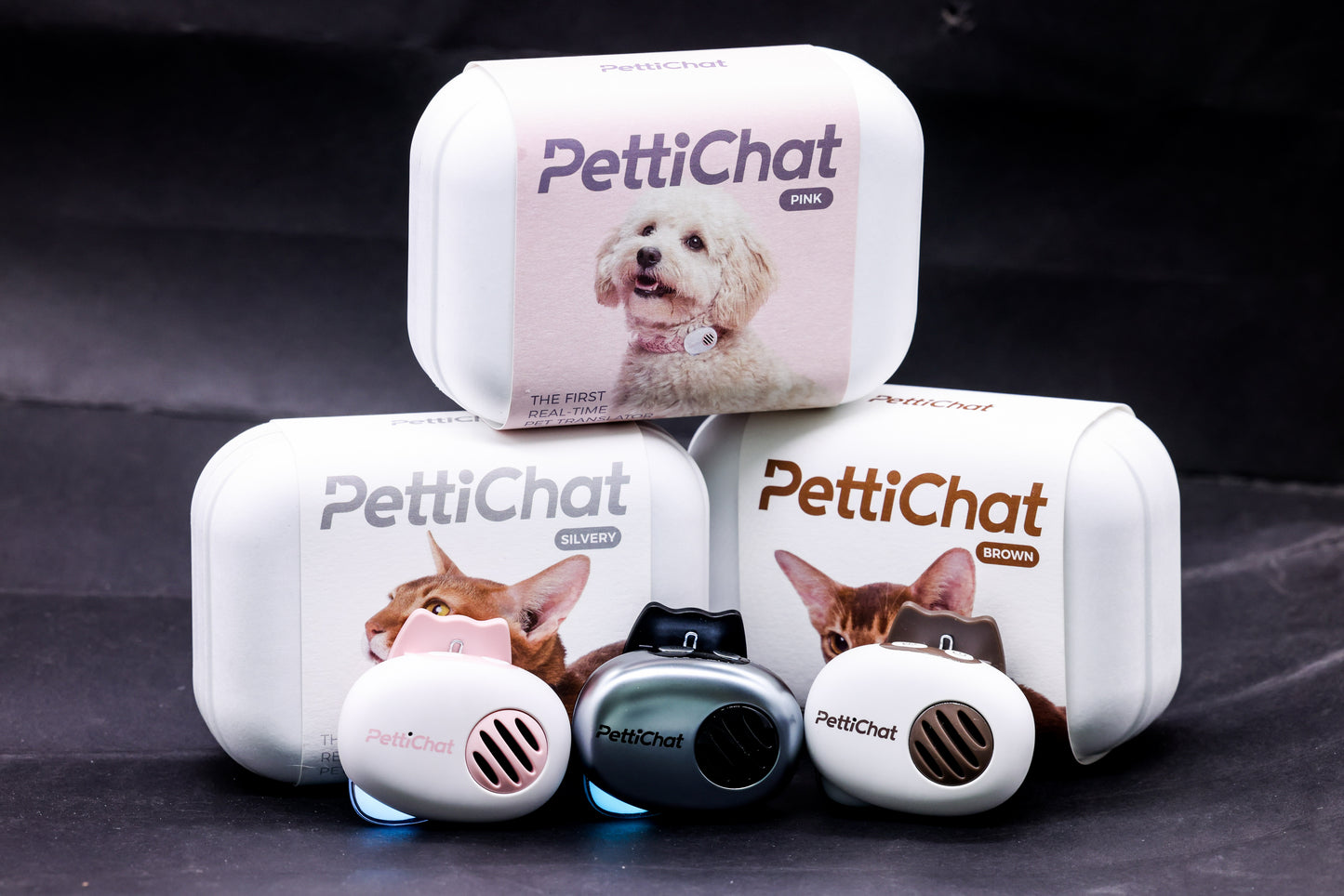 PettiChat pet communication device with packaging on a dark background